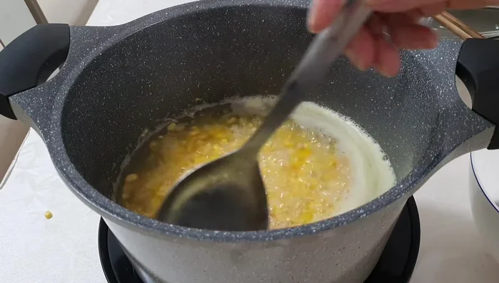 Blend the corn: Blend the cooked corn kernels and filter to remove any pulp.