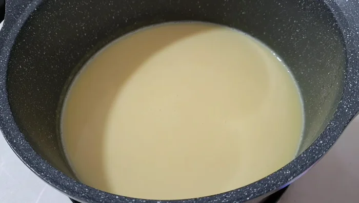Assemble and serve: Once cooled, scoop the jelly into cups or bottles. Pour the corn milk over the jelly and serve.