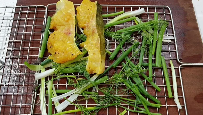 Grill the fish until golden brown on both sides.