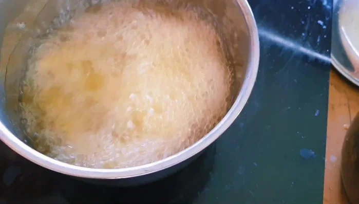 Fry potatoes in hot oil until golden brown (about 3 minutes), stirring occasionally. Drain on a wire rack. (467.9)