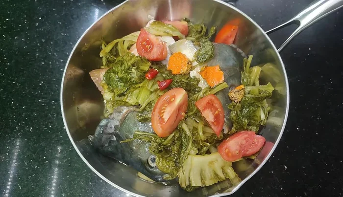 Add enough water to cover the fish.