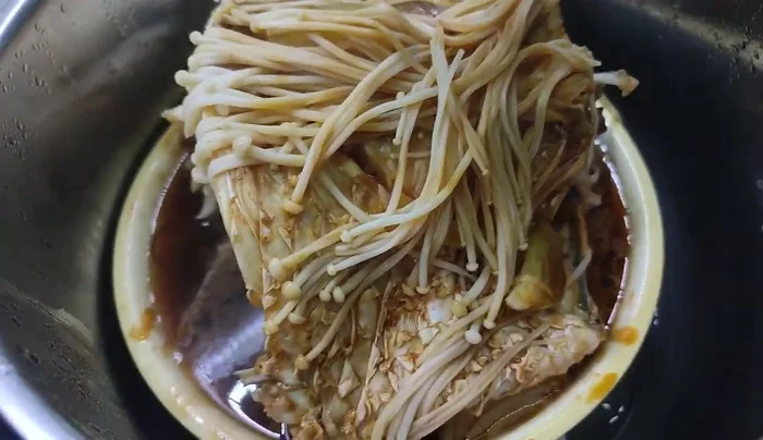 Add mushrooms and steam for another 15 minutes.