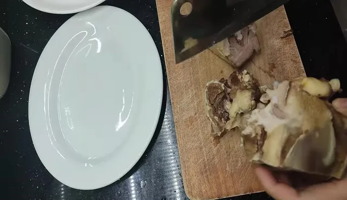 Slice the cooled tongue thinly and serve. For a hot dish, let it cool slightly before slicing.