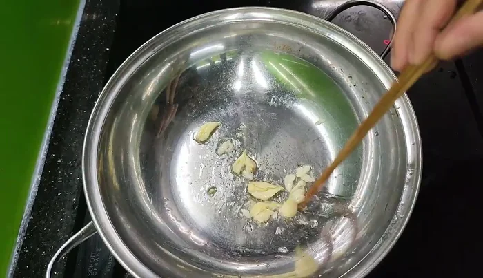 Sauté onions and garlic until fragrant.