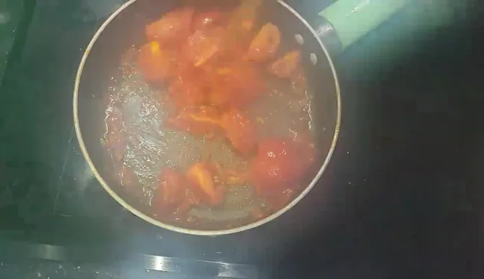 Stir in tomato juice, salt, and MSG.