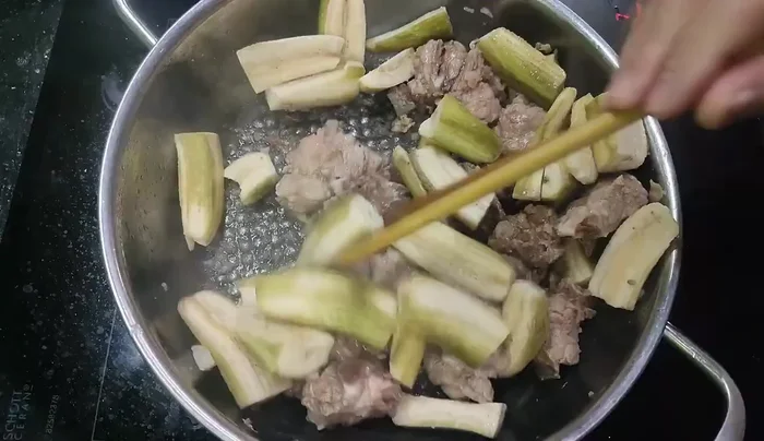 Add enough water to cover the ingredients and bring to a boil. Skim off any foam.