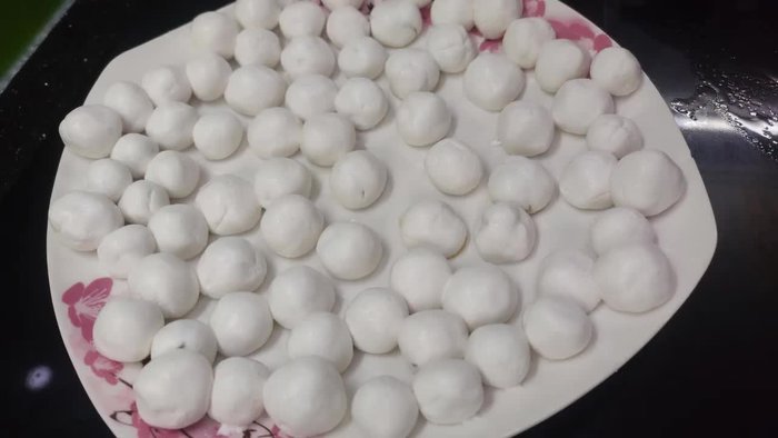 Roll out the dough and divide it into small pieces, sized to fit your sugar portions.