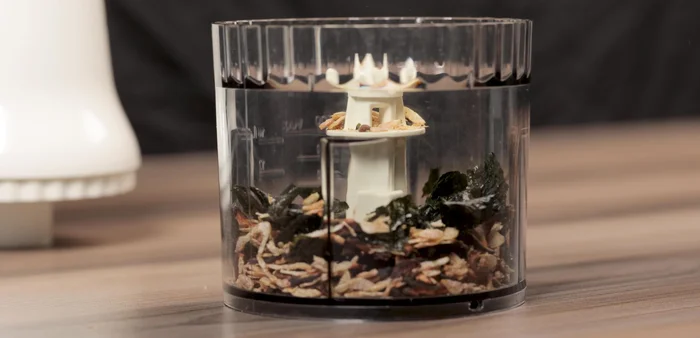 Blend or process the cooled ingredients until smooth. If the mixture is too warm, let it cool down before blending to avoid a fishy smell and ensure easier processing.