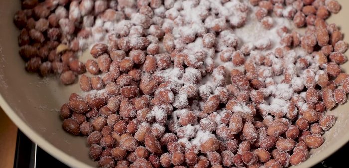 Mix well. Continue roasting until the sugar is dissolved and slightly caramelized.