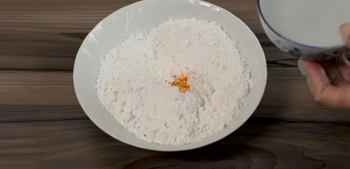 Make the Dough Base: Add 1 cup of water to the mixed dry ingredients and stir until it forms a smooth paste. This is the base dough.