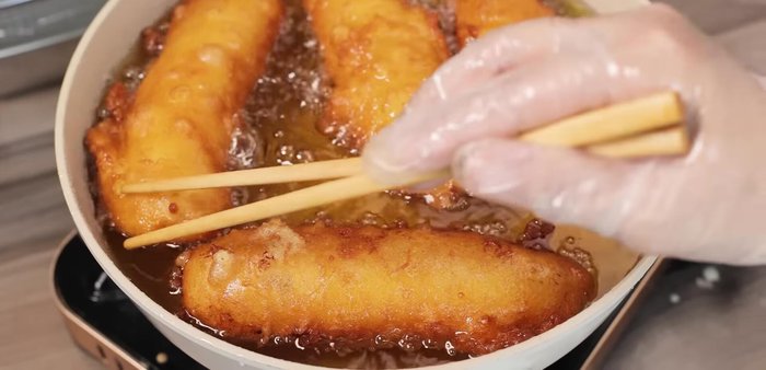 Drain and Serve: Once golden brown, remove the cakes from the oil and prop them up to drain excess oil. Serve immediately for best results.