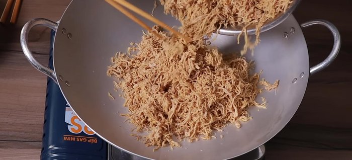 First Fry: Divide the shredded pork into two batches. Add half of the pork and half of the spice mixture to a pan. Cook over medium-low heat until the pork starts to slightly dry and fluff up, stirring frequently. Turn off heat once the pork is fluffy.
