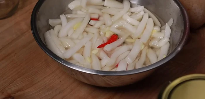 Pack the radish mixture tightly into a clean jar. You can add more vinegar to fill the jar if needed. (353.99)