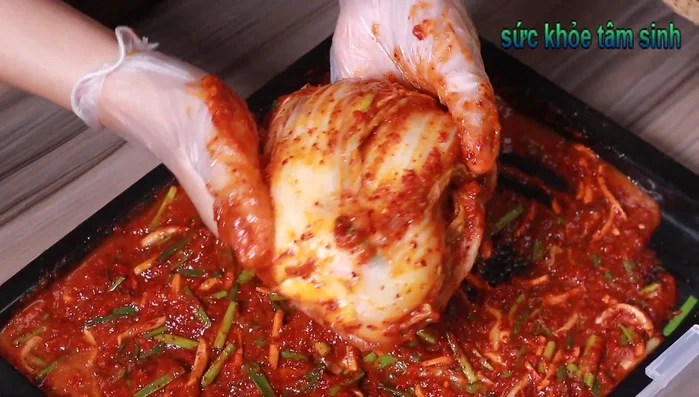 Pack the kimchi into a jar or container, ensuring it’s tightly packed.
