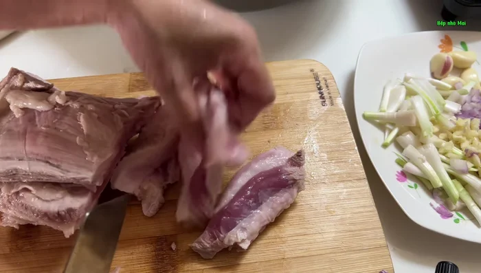 Marinate the pork ribs and pork belly separately. Create two marinades: one for grilling and one for frying.