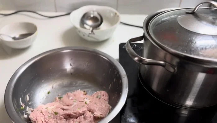 Prepare crab patties: Mix crab meat, minced pork, and seasonings. Fry until cooked through.