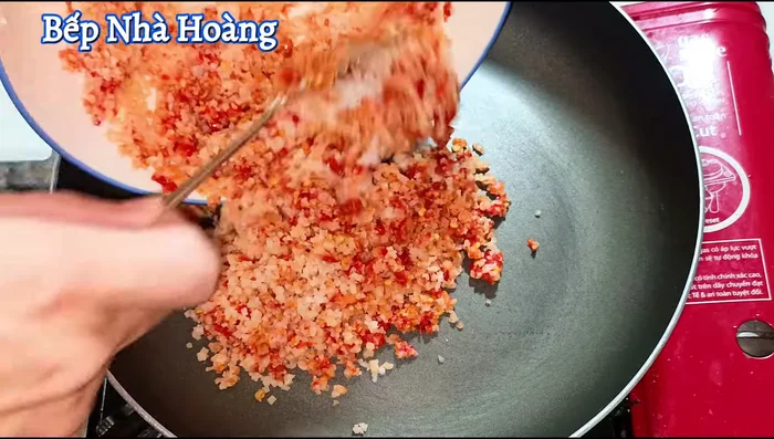 Transfer the mixture to a pan and place it over low heat.