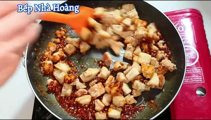 Add the pork fat to the pan and stir well to coat with the sauce.