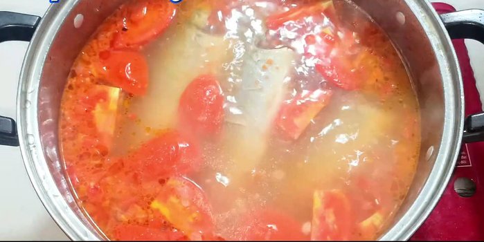 Reduce heat to low. Season with sugar, seasoning powder, sweet powder, fish sauce, and salt to taste.