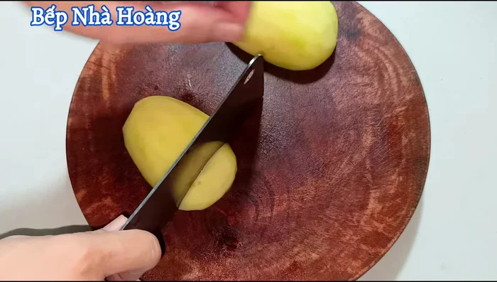Prepare the vegetables: Cut Chinese cabbage into small square pieces (54.68). Cut carrots and beets into slightly larger pieces, adjusting size as needed for even cooking (69.04, 72.68, 77.96, 81.52). Chop green onions and cilantro finely (159.879). Finely chop garlic and shallots (174.879).