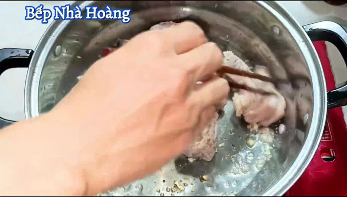 Add the marinated ribs to the pot and stir-fry briefly until they firm up.