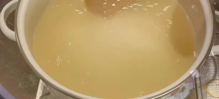 Cook the jelly mixture over medium heat until it boils. Reduce heat to low and cook for another 7-8 minutes, or until slightly clear.
