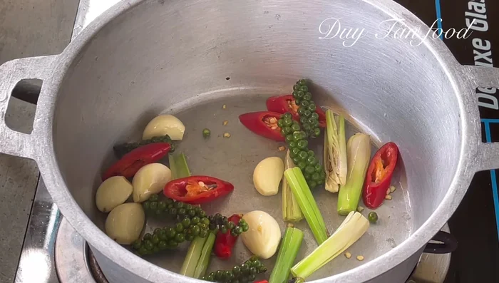 Add coconut water: Add 300ml of fresh coconut water (or filtered water) and bring to a boil.