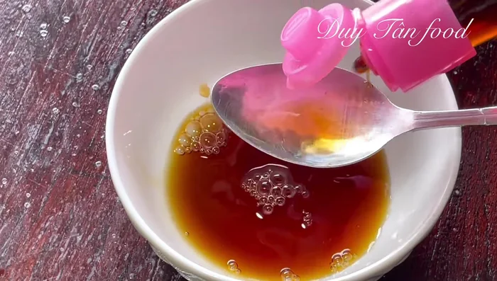 Prepare the marinade: Mix fish sauce, chili sauce, oyster sauce (optional), sugar, seasoning powder, MSG (optional), pepper, and annatto oil in a bowl. Stir well.