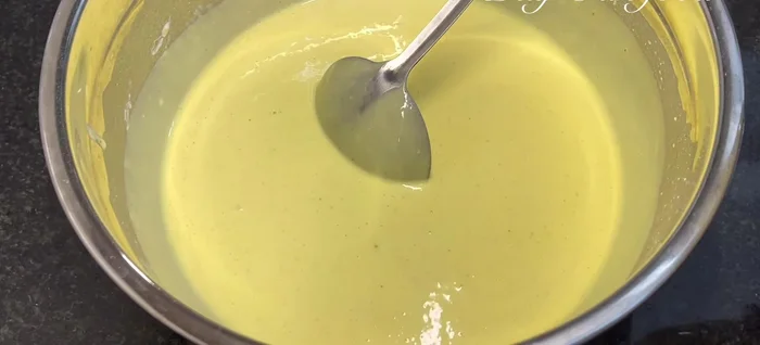 Mix half of the cooked mung beans into the rested dough.