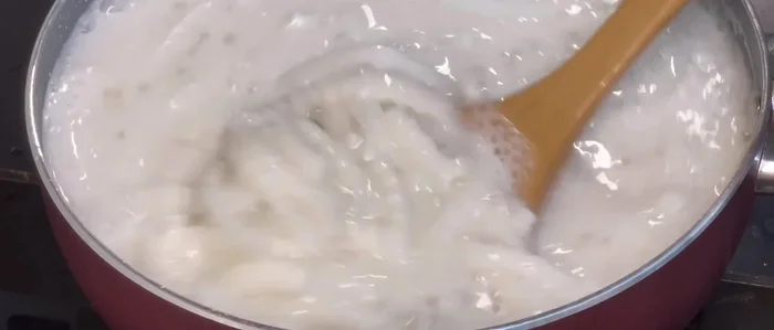 Assemble the dessert: Let the coconut milk mixture cool completely. Cut the set pandan jelly into pieces (some shredded, some cubed). Layer the pandan jelly and young coconut mixture in a bowl, adding Thai jackfruit, peanuts, or vanilla extract as desired. Serve chilled.