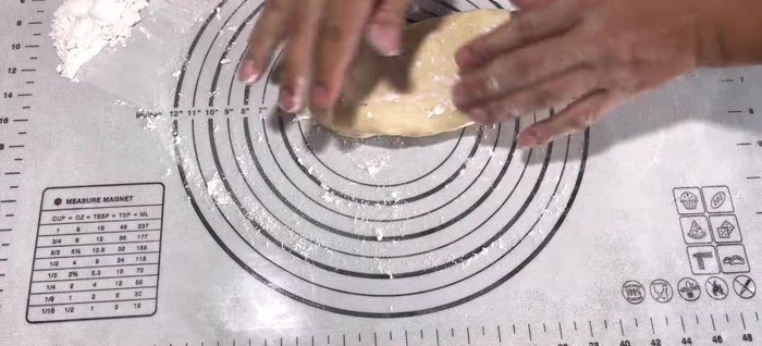 Lightly flour a surface. Roll out the rested dough to a thickness of 0.5cm. Cut into strips (2.5-3cm wide).