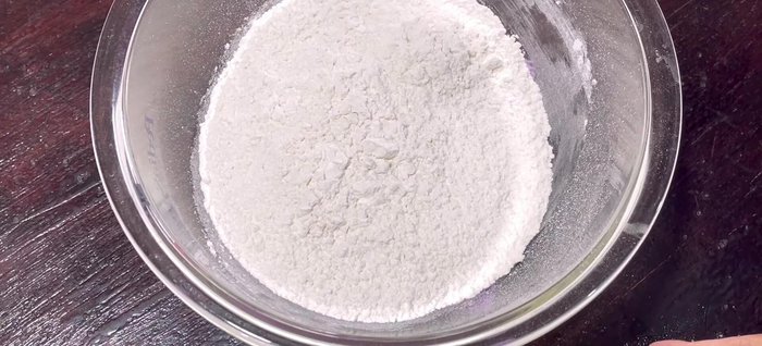 Combine flour, baking powder, baking soda, salt, sugar, and egg in a bowl. Gradually add water and whisk until sticky.
