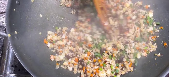 Stir in green onions and pepper.