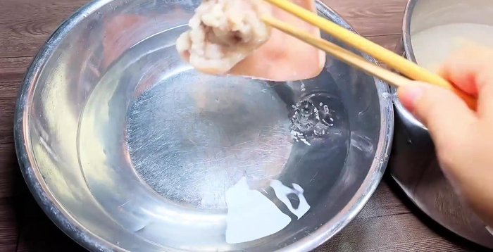 Cool the boiled pork skin and pig ears in cold water for easier cutting.