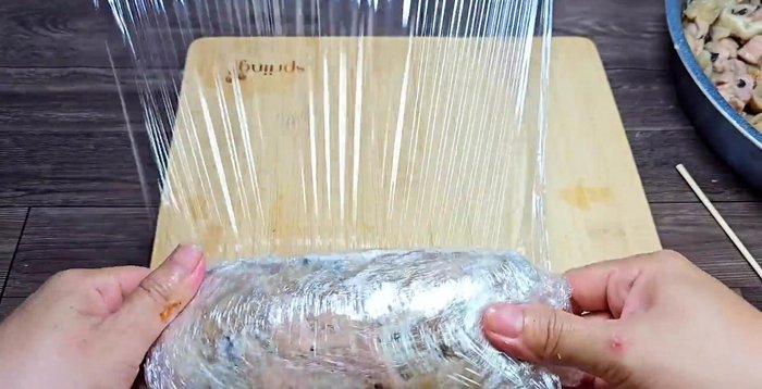 Wrap the roll tightly with multiple layers of plastic wrap and secure with many rubber bands.