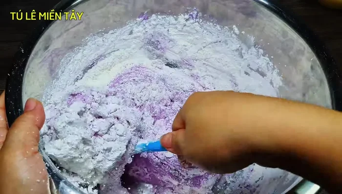 Gradually add sticky rice flour, mixing until a dough forms. Adjust flour if needed to achieve a non-sticky consistency.