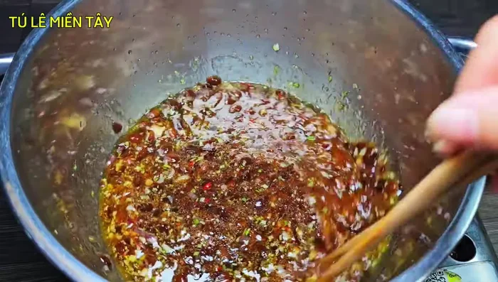 Add the bean paste and stir well. Add sugar and MSG.