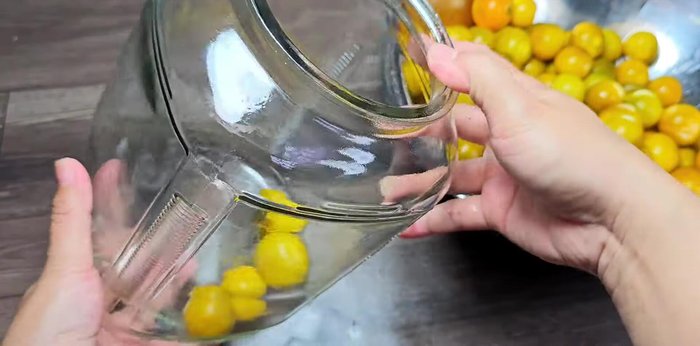 Place the kumquats in a clean, dry jar. Add the cooled salt water, ensuring the jar is completely dry to prevent floating.