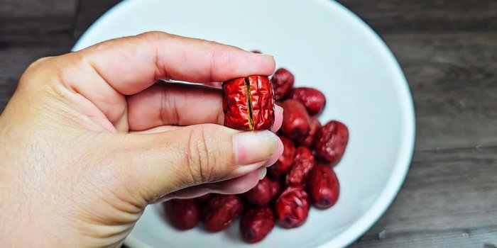 To soften the red apples quickly, score the skin before cooking.