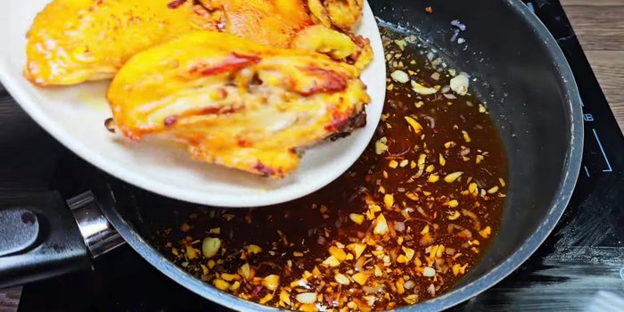 Add the fried chicken to the pan and stir well to coat with the sauce.
