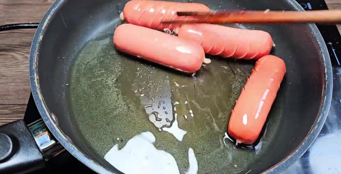 Prepare the sausage: Slice and fry the sausage until golden brown.