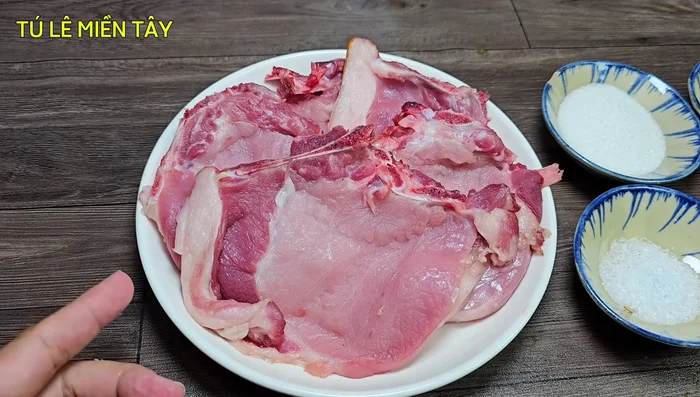 Choose pork chops with two skins (one dark, one light side). Cut the bony tip in half to prevent uneven shrinking during frying.