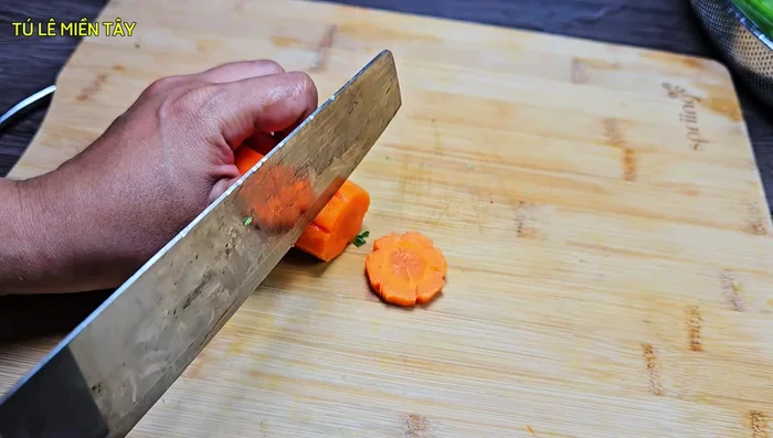 Prepare the carrots: Cut into small, flower-shaped pieces.