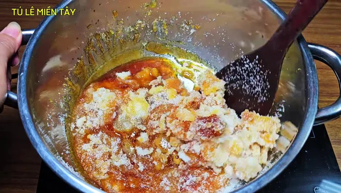 As the sugar melts, it will gradually dissolve. If it takes a long time, use a utensil to help break up clumps and ensure even melting.