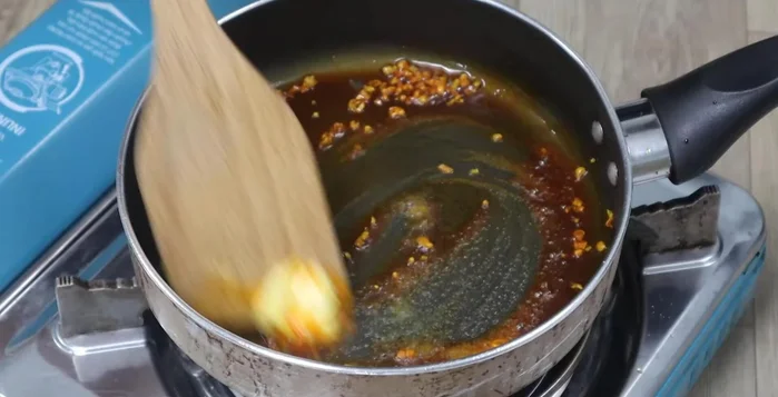 Add 1 tbsp of butter and 2 tsp of sugar to the pan with the fried green onions; stir until melted. Remove from heat and let cool.