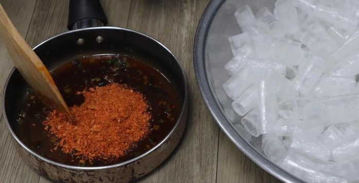 Combine the cooled onion-butter mixture with the ground carrot and onion mixture. Wet your hands to help evenly distribute the mixture.