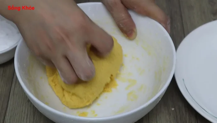 Knead the dough until smooth and it no longer sticks to your hands.