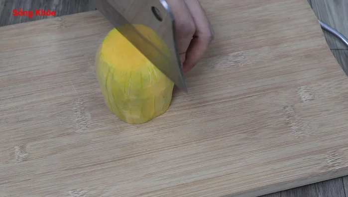 Peel and cut the pumpkin into pieces for quicker boiling or steaming.