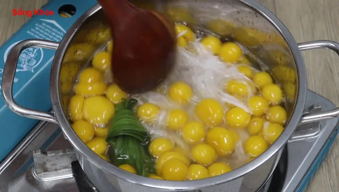 Add the young coconut and cook until slightly clear.