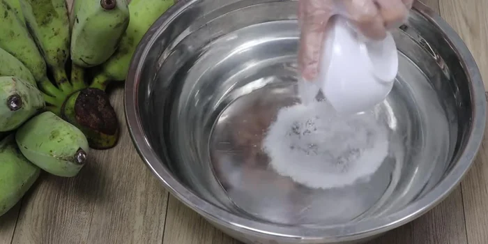 Peel bananas: Slice the banana lengthwise, then peel it carefully, using gloves or a bag to avoid staining your hands.